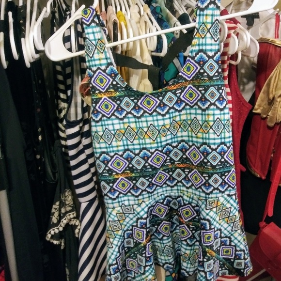 Sleeveless Peplum Top - Picture 3 of 3